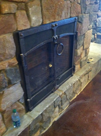 Iron fireplace grill